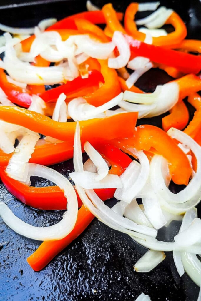 heat your Blackstone grill to medium-high heat and brush it with a thin layer of oil